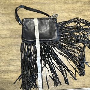 Black fringed Carlos wristlet